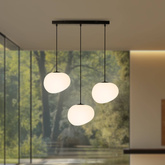 Lampa wisząca STONES w stylu Japandi - podłużna z akrylowymi kloszami 20 cm w kształcie kamienia - minimalistyczna lampa nad stół 3x E27