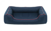 Legowisko dla psa Sofa Valencia Standard w kolorze granatowym z czerwonym wykończeniem Rozmiar: M - 80 x 60 cm